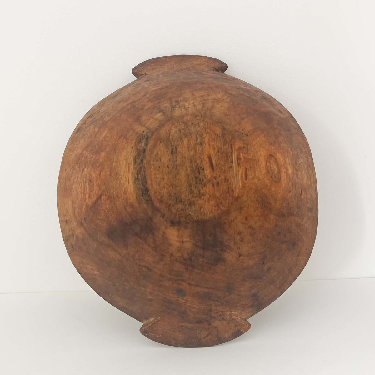 One-of-a-kind antique round wooden bowl showing natural wood grain, aged patina and authentic handmade craftsmanship from circa 1920