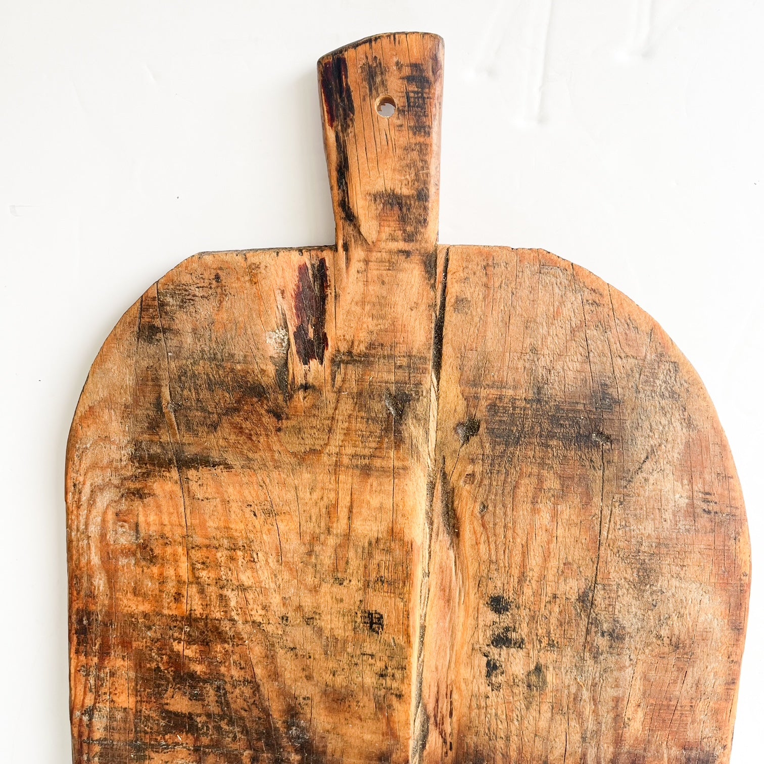 Rustic farmhouse wooden bread board used as serving tray