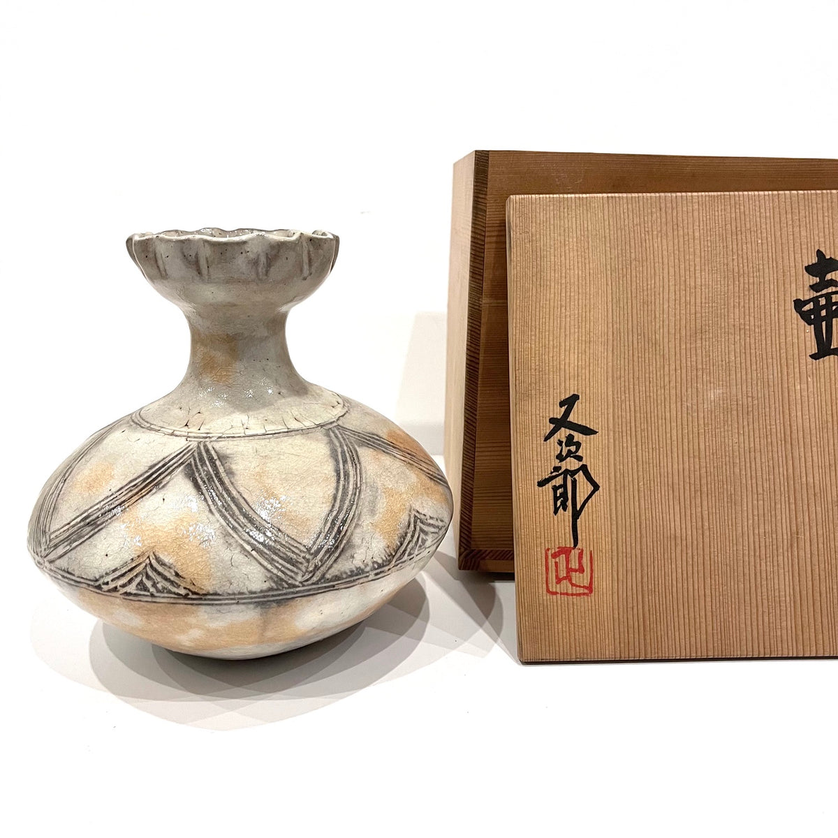 Japanese ceramic vase with rounded body
