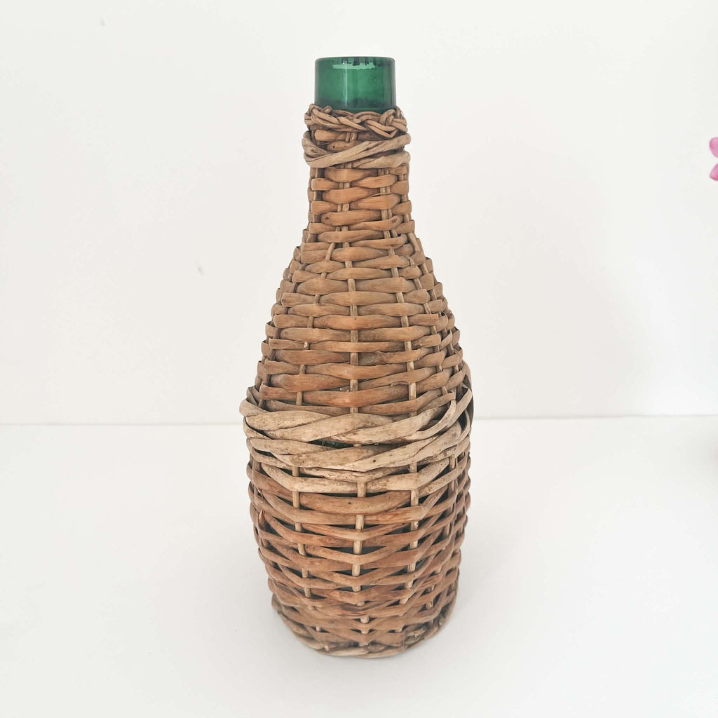 Rattan wicker demijohn with flattened oval shape - rare collectors item