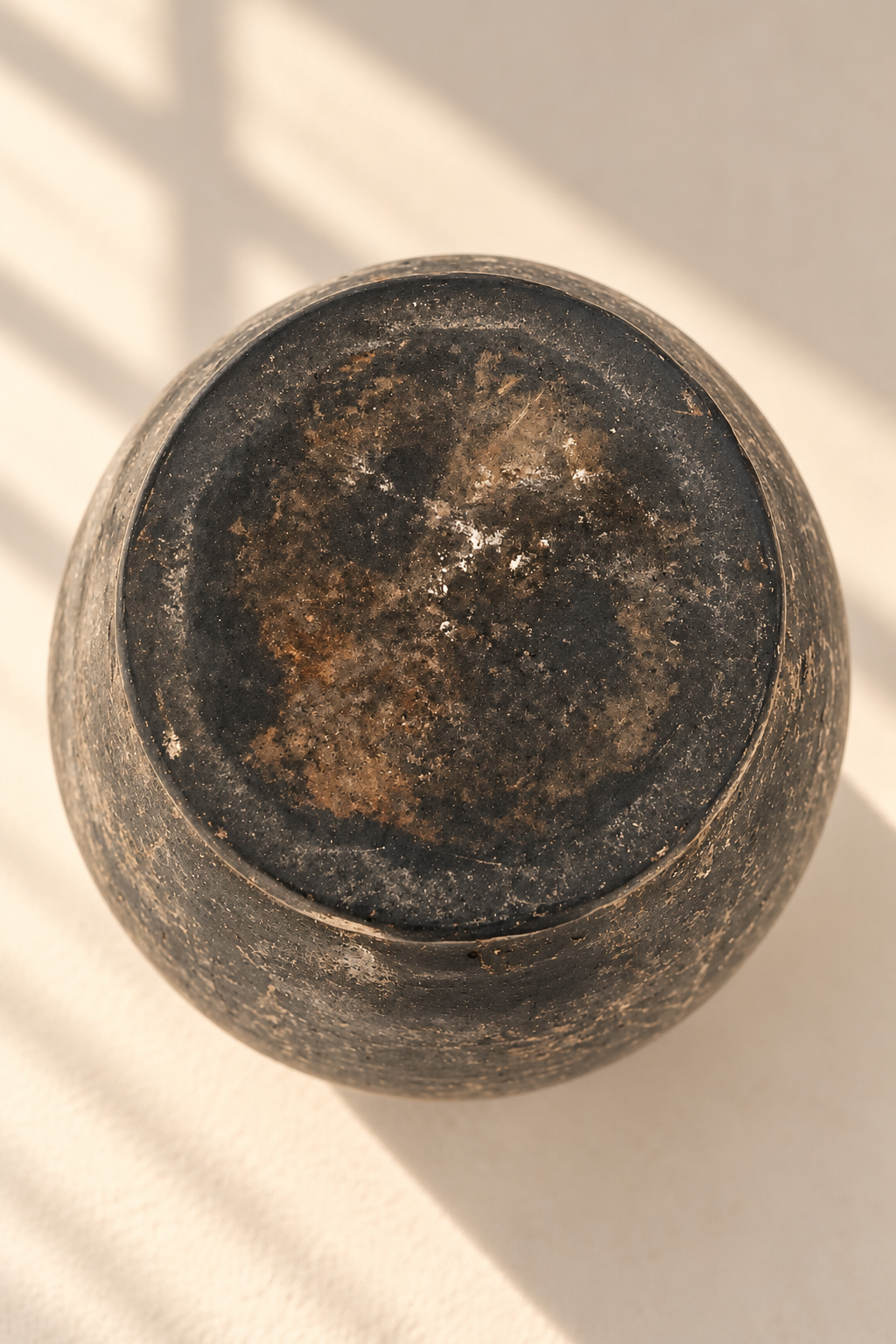 bottom view of an antique terracotta vessel