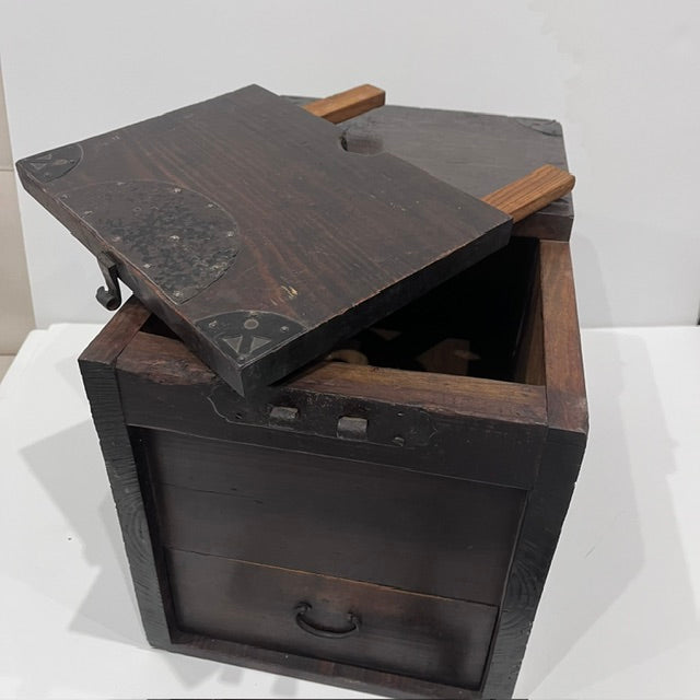 Open antique Japanese Zenibako showing the wooden interior and coin storage