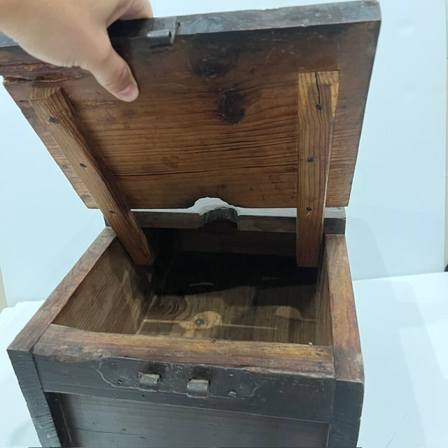 Open antique Japanese Zenibako showing the wooden interior