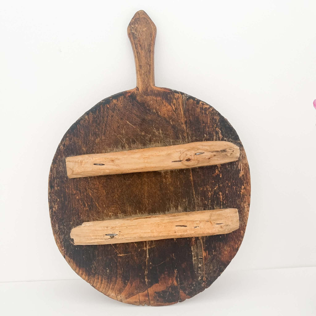 antique bread board with legs