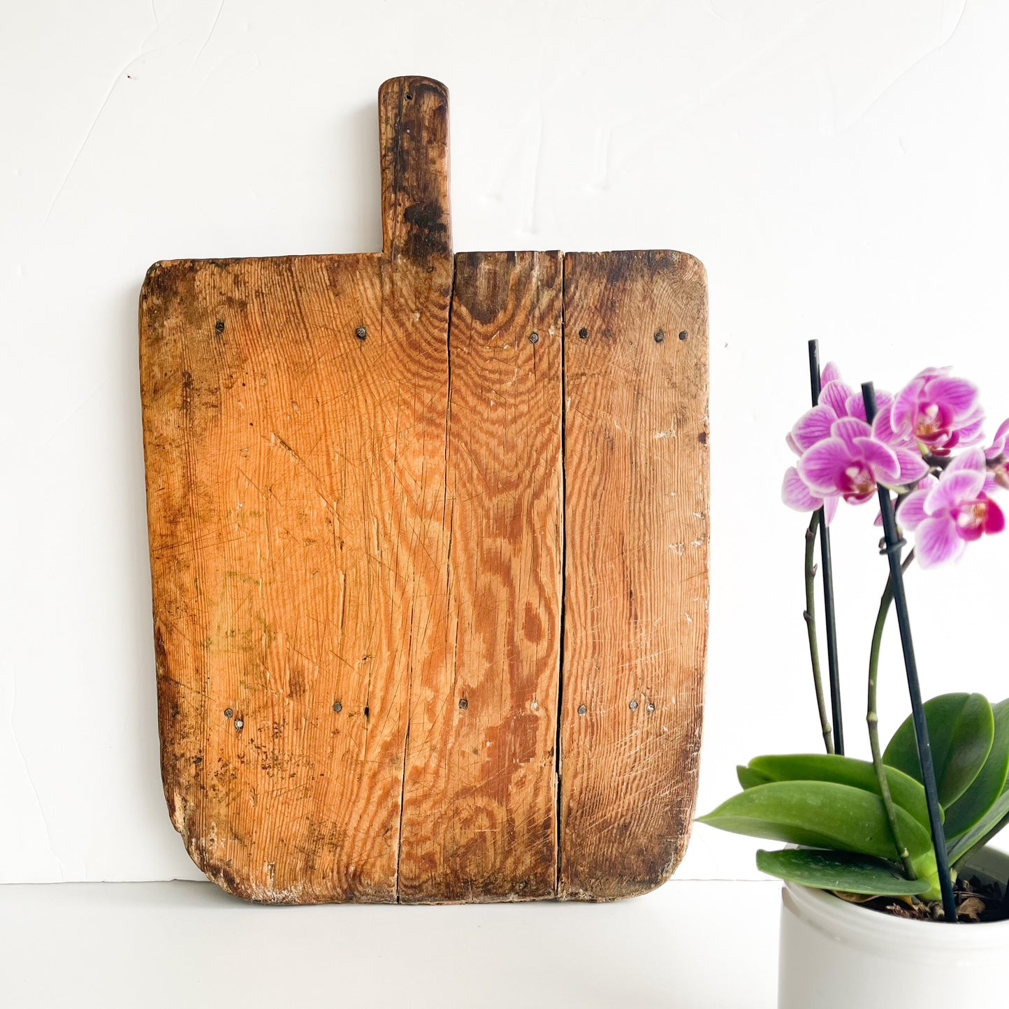 Antique rectangular wooden bread board with handle