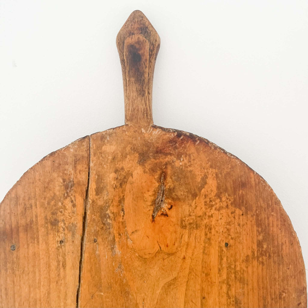 old bread board with handle