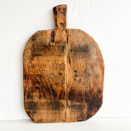 Antique oval wooden bread board with handle