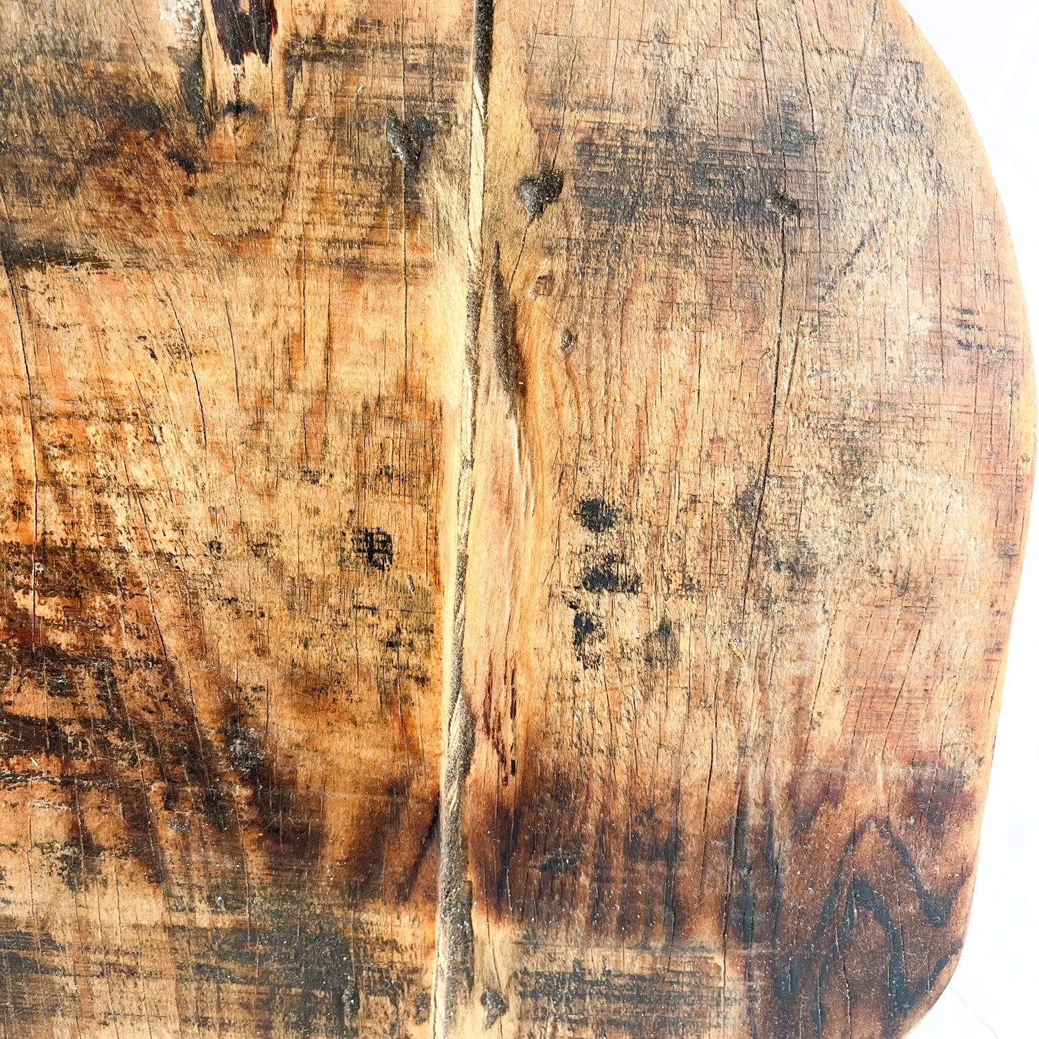 Vintage wooden bread board displayed as country kitchen wall decor