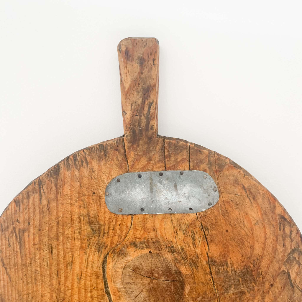 Vintage round wooden bread board