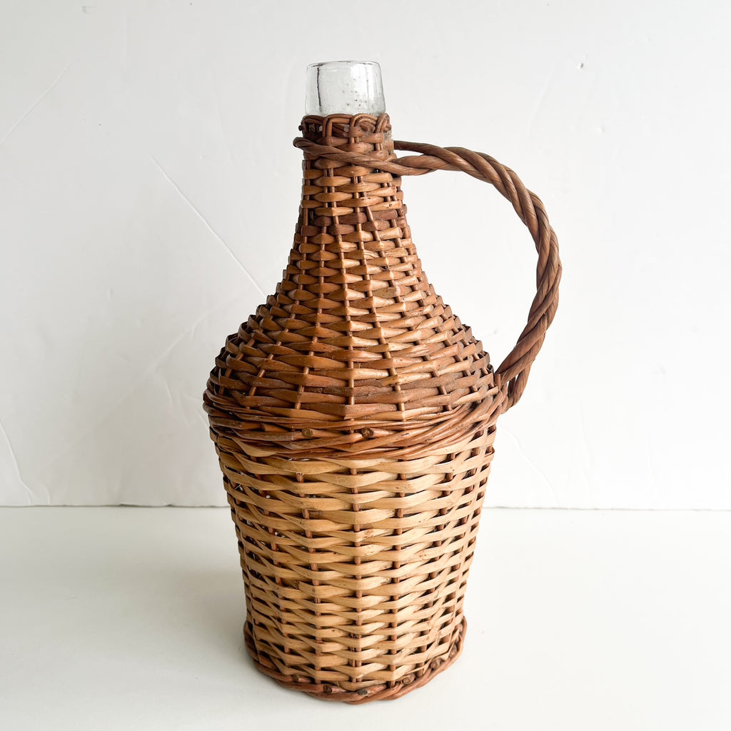 Vintage wicker demijohn