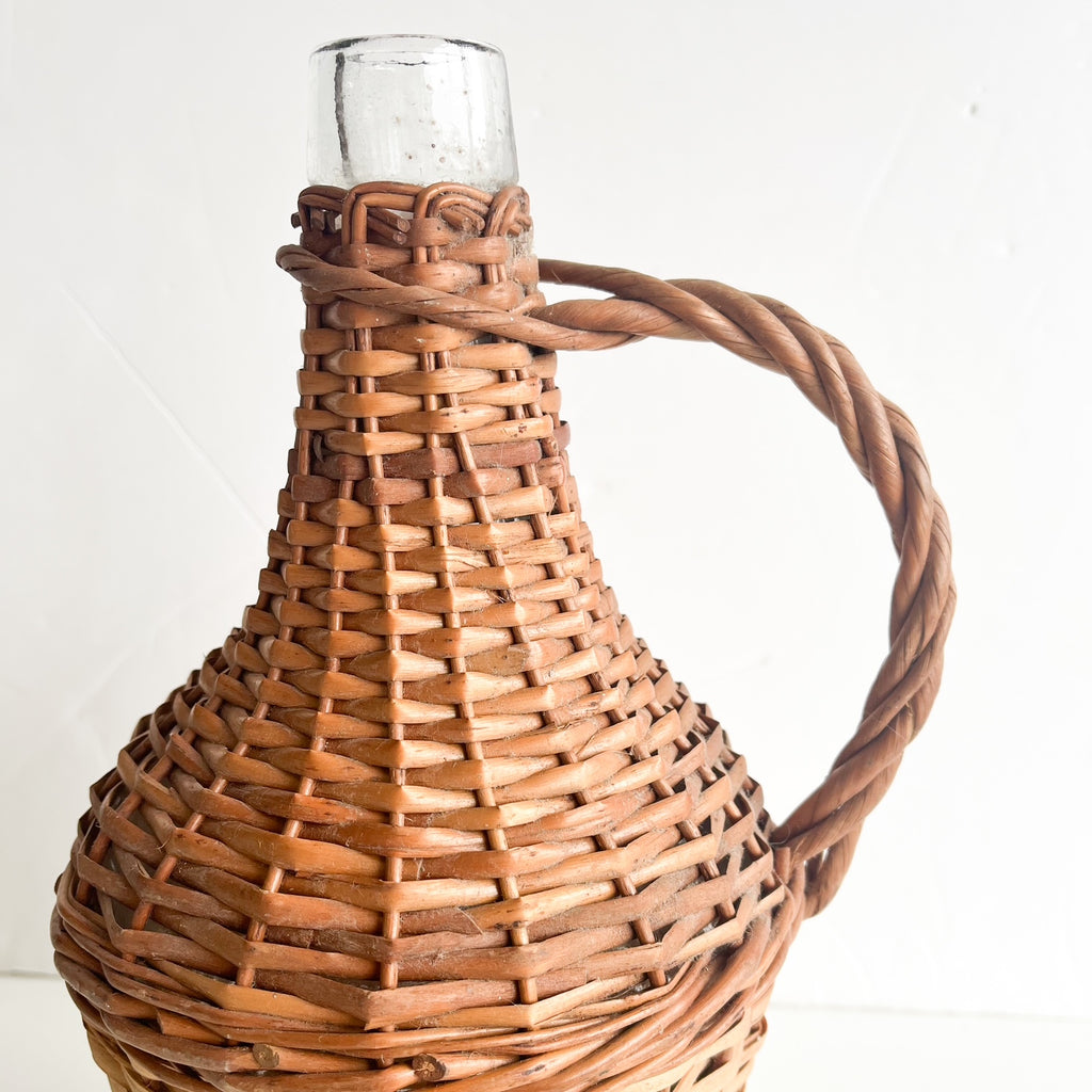 Antique wicker demijohn