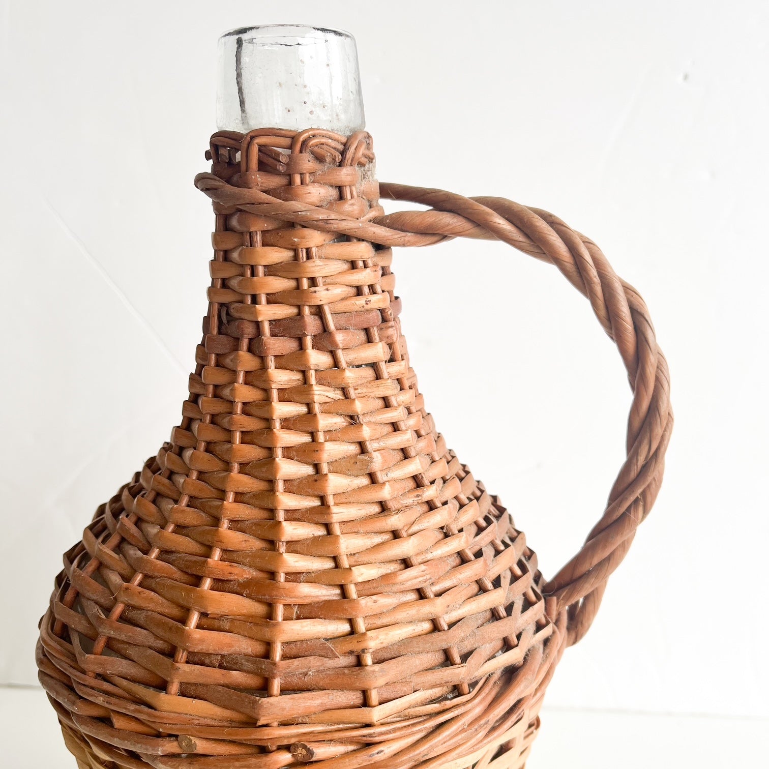 Antique wicker demijohn